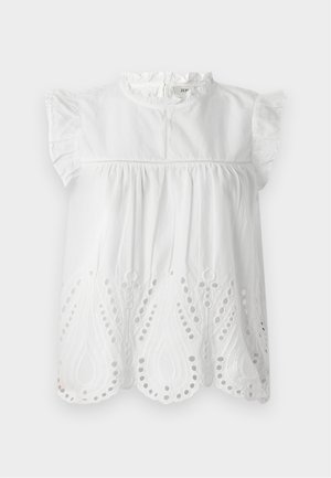 White cotton blouse with ruffled cap sleeves, a high collar, and embroidered eyelet detailing at the hem in a paisley pattern.