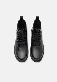 Calvin Klein Jeans EVA BOOT MID LACEUP - Botines bajos - triple black