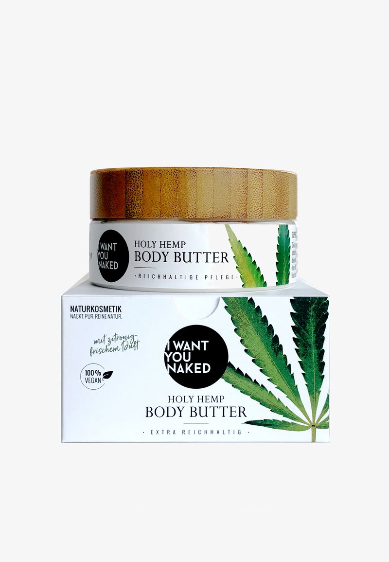 Burkar med bambulock av Holy Hemp Body Butter med en vit låda. Design med gröna hampabladsmotiv, svart och guldtext. 100% vegan, naturliga ingredienser.