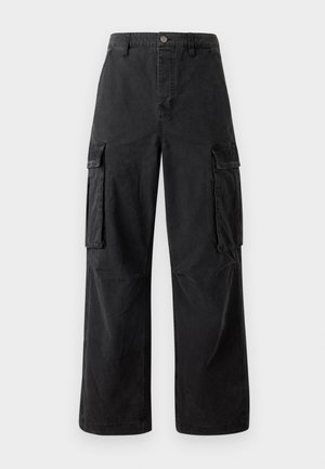 Black cargo pants made of cotton blend fabric, featuring wide legs, two side pockets, and a button closure at the waist.