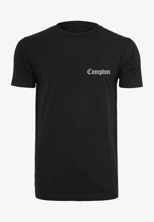 Fekete pamut póló rövid ujjakkal, bal mellrészen díszes betűtípussal feltüntetve a "Compton" felirat.