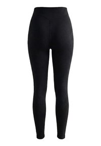 Leggings noirs côtelés taille haute avec un détail de ceinture en forme de V, jambes resserrées et coupe ajustée de la taille aux chevilles.