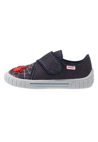Blue canvas shoe with spider embroidery, white rubber sole, Velcro strap, and gray accents. Textured fabric with spider web design.