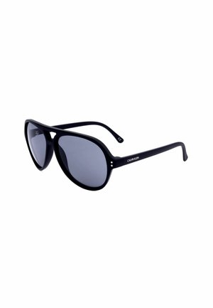 Occhiali da sole stile aviator neri Calvin Klein con lenti scure e aste sottili su sfondo bianco.