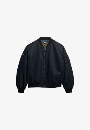 Marineblau bomberjacke mit Reißverschluss, gerippten Bündchen und Saum. Verfügt über Seitentaschen und eine Utility-Tasche am Arm. Glattes, glänzendes Material.