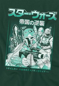 Dark green t-shirt featuring a vintage-style graphic of characters from a sci-fi series in teal ink, with intricate details and Japanese text.