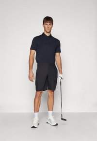 TravisMathew THE HEATER - Pólóing - black