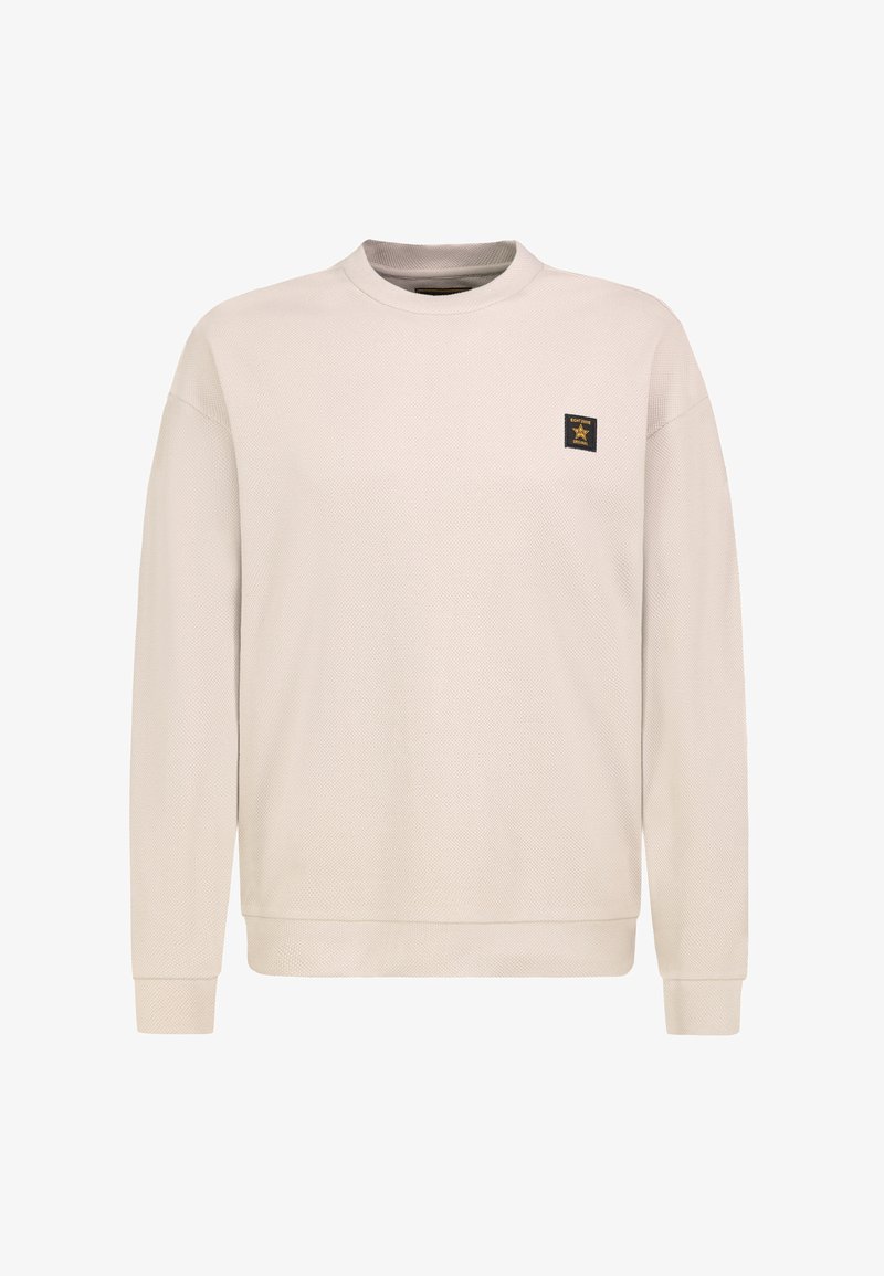 Light beige sweatshirt with a textured fabric, round neckline, and long sleeves. Features a small black logo patch on the left chest.