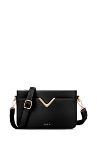 Černá crossbody taška vyrobená z syntetického materiálu, s zlatým V-tvarovaným akcentem, nastavitelným popruhem a raženým logem značky.