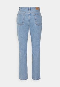 Light blue denim jeans with a straight-leg design, five pockets, and a brown label on the back waistband. Smooth texture, classic fit.