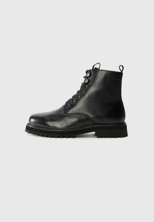 Bottines à lacets - black