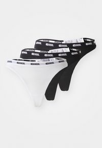 Three pairs of cotton thong underwear: one white and two black. Each features a branded elastic waistband with a repeating logo pattern.