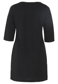 Schwarze Tunika mit Dreiviertelärmeln, glatter Textur, rundem Halsausschnitt und geradem Schnitt. Mit seitlichen Schlitzen am Saum.