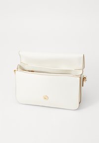 Tommy Hilfiger LIBRE FLAP CROSSOVER - Skulderveske - ivory silk