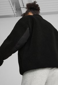 Puma REVERSIBLE - Chaqueta de invierno - black
