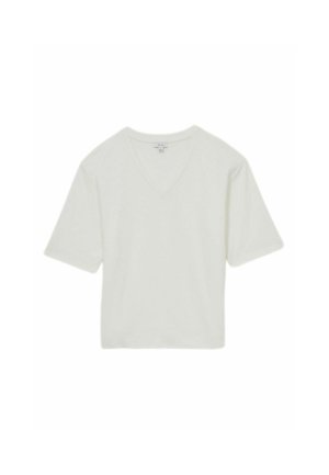 Īsām piedurknēm, V-veida kakla T-krekls gaiši krēmkrāsā, izgatavots no mīksta auduma, ar brīvu piegriezumu un vienkāršu dizainu. Nav ievērojamu rakstu vai akcentu.