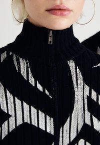 Jaded London TRIBAL DISCHARGE UNISEX - Cardigan - black