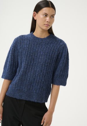 Blue knit sweater with short, wide sleeves and a ribbed texture. The fabric appears soft and slightly fuzzy, with a relaxed fit.