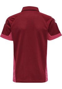 Mörkröd polo skjorta med krage och korta ärmar. Har rosa detaljer på ärmar och sidopaneler. Tillverkad av lätt och ventilerande tyg.