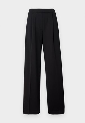 Pantalon large noir en tissu lisse, avec un design uni et une taille élastique, sans motifs ni accents visibles.