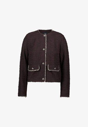 Schwarze, cropped Jacke aus strukturiertem Stoff, mit zwei vorderen Taschen, Knopfverschlüssen und weißen Akzenten entlang der Kanten.