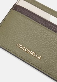 Coccinelle Denarnica - brown/green/off-white