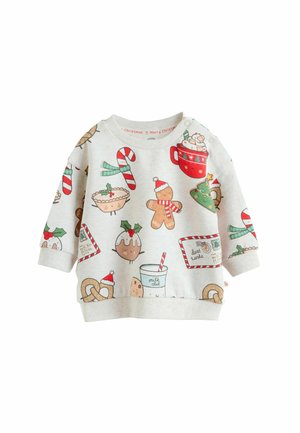 Sweatshirt gris clair en tissu doux, avec des illustrations sur le thème de Noël incluant des bonhommes en pain d'épice, des cannes en sucre et des desserts festifs.