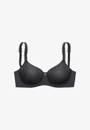 Schwarzer Bügel-BH mit leicht gepolsterten Cups und spitzenbesetzten verstellbaren Trägern, mit kleinem zentralem dekorativem Anhänger.