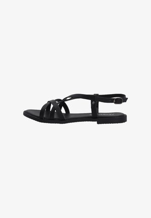 Sorte flade sandaler med flere krydsende stropper og en justerbar ankelspænde. Tekstureret sål for godt greb og komfort. Letvægtsdesign.