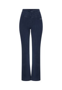 Pantalones de yoga azul marino en una tela elástica, con un diseño de cinturilla retorcida y piernas rectas, con costuras sutiles y sin bolsillos visibles.