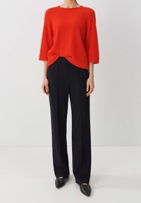 someday. Stickad tröja - red