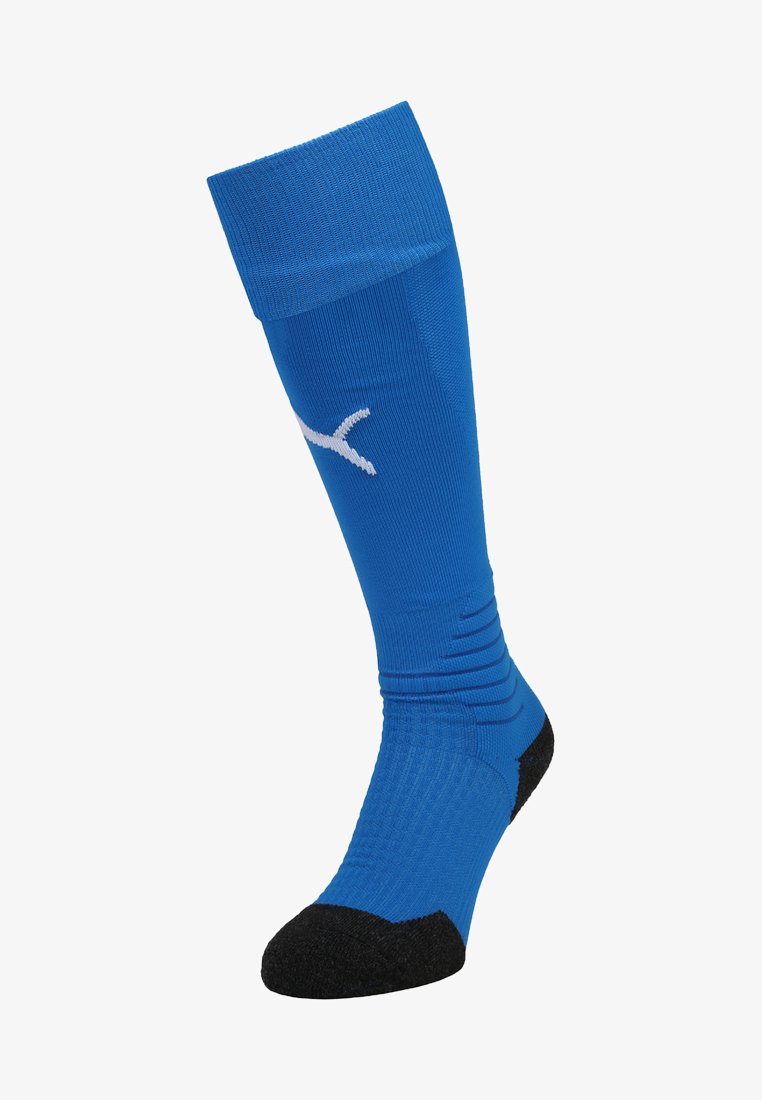 Μπλέ αθλητική κάλτσα με μαύρη προστατευτική μύτη. Διαθέτει ριμπ υφή, μαξιλαρωμένο πέλμα και άσπρο λογότυπο. Σχεδίαση μέχρι το γόνατο για επιπλέον στήριξη.