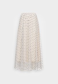 Falda midi de lunares en crema y azul marino. Cuenta con una cinturilla fruncida, una capa transparente y un sutil detalle de volantes en el dobladillo.