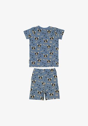 Kaksi-osainen puuvillapyykkisarja vaaleansinisessä sävyssä, jossa on ympäriinsä painettuja koirankasvoja, luita ja tassunjälkiä. Lyhyet hihat ja joustovyötärö.