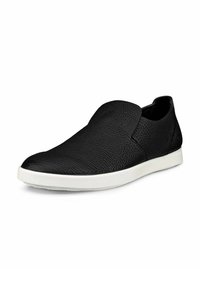 Scarpa nera in pelle con superficie testurizzata, suola in gomma bianca a contrasto, punta arrotondata e design minimalista.