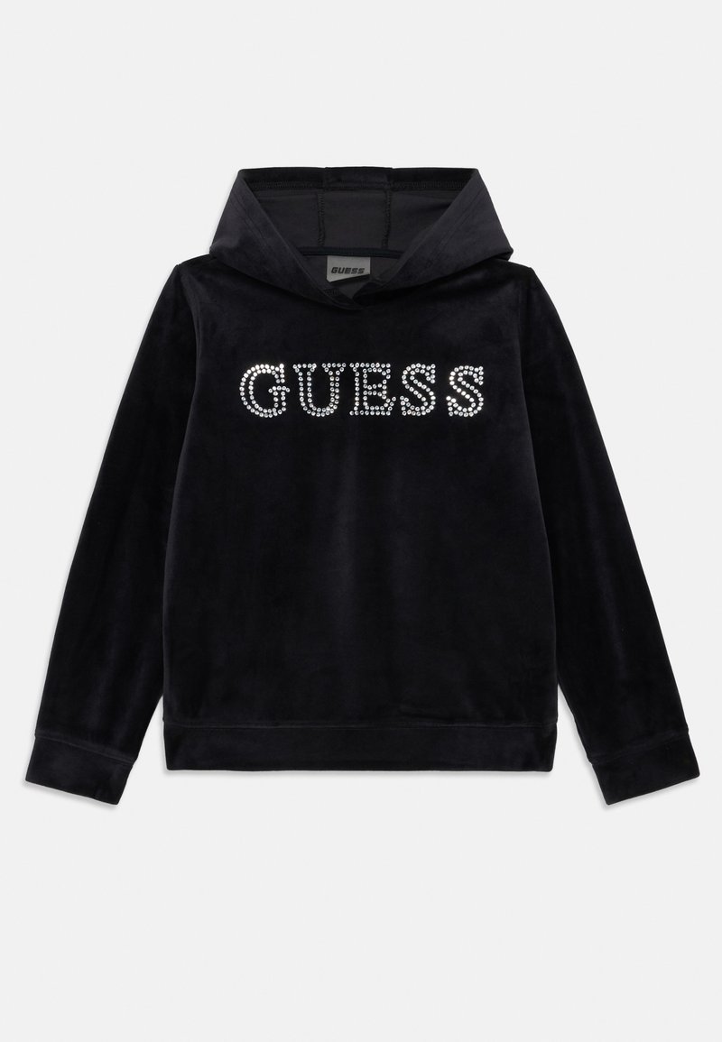Haut à capuche en velours noir avec un col haut et des manches longues. Présente le mot "GUESS" en strass sur le devant. Texture douce avec une coupe décontractée.