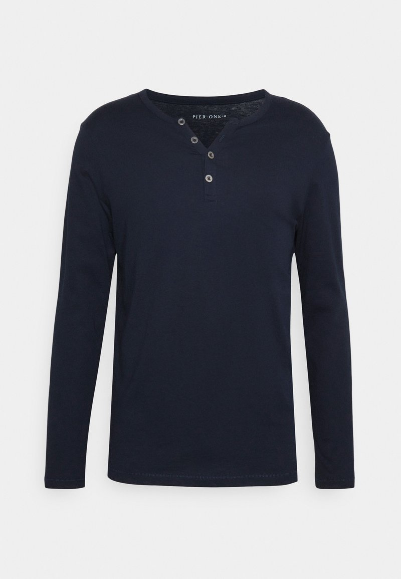 Maglietta henley a maniche lunghe blu navy in morbido cotone, con scollatura rotonda, patta con tre bottoni e taglio dritto.