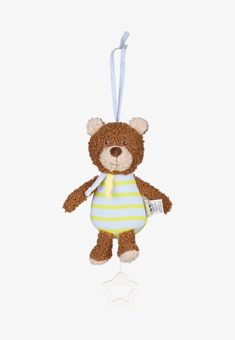 Jouet en peluche ours brun avec une tenue rayée jaune et verte, suspendu par une boucle, tirant une poignée en plastique blanche en forme d'étoile dessous.