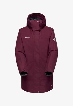 Lange bordeaux waterproof winterjas met capuchon, verstelbare manchetten, voorrits bedekt met een flap, en Mammut-logo op de borst en mouw.