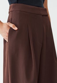 CALLI RENILA - Pantaloni - chocolate