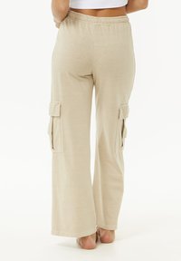 Rip Curl BLOCK PARTY - Pantalones cargo - natural