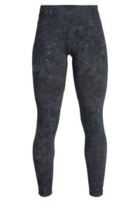 Svartmönstrade leggings i elastiskt tyg, med hög midja och en åtsittande design med en texturerad yta och subtila detaljer.