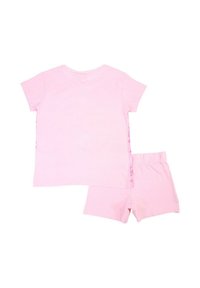 T-shirt en coton rose à manches courtes assorti à un short. Le t-shirt présente un design simple ; le short possède une ceinture élastique.