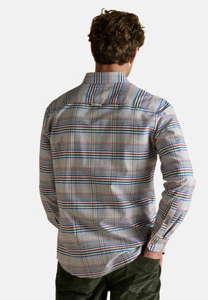 Karobluse aus einem Baumwoll-Mix mit mehrfarbigen Mustern in Rot, Blau und Grün. Lange Ärmel und geknöpfte Manschetten, lässige Passform.