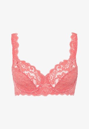 Koronkowy bralet w kolorze koralowym z kwiatowymi wzorami, falbaniastymi krawędziami i szerokimi ramiączkami. Wykończenie jest przezroczyste i gładkie, z teksturowanym wykończeniem.