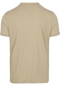 Camiseta de manga corta beige hecha de tejido suave, con cuello redondo y dobladillo recto, sin patrones ni gráficos visibles.