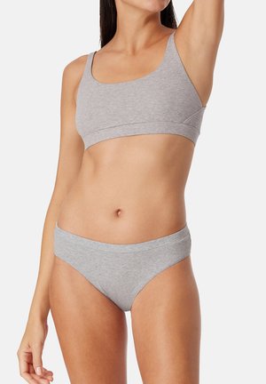 Set di reggiseno e bikini in cotone grigio con una texture liscia e stretch, spalline larghe e un design minimalista. Nessun motivo o dettaglio visibile.