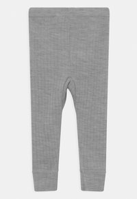 Graue Leggings aus geripptem Stoff, mit einer figurbetonten Passform, elastischem Bund und gerippten Bündchen an den Knöcheln.