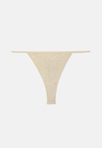 String beige en coton avec fines ceintures élastiques et un panneau avant triangulaire sur un fond clair uni.