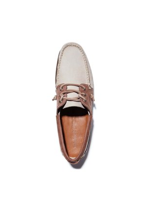 Light gray leather boat shoe with brown leather accents, round laces, and a textured brown insole. Features stitching along the edges.